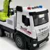 A white engineering vehicle toy with a green excavator arm and a grey bucket, a children's educational simulation model Application Scenario